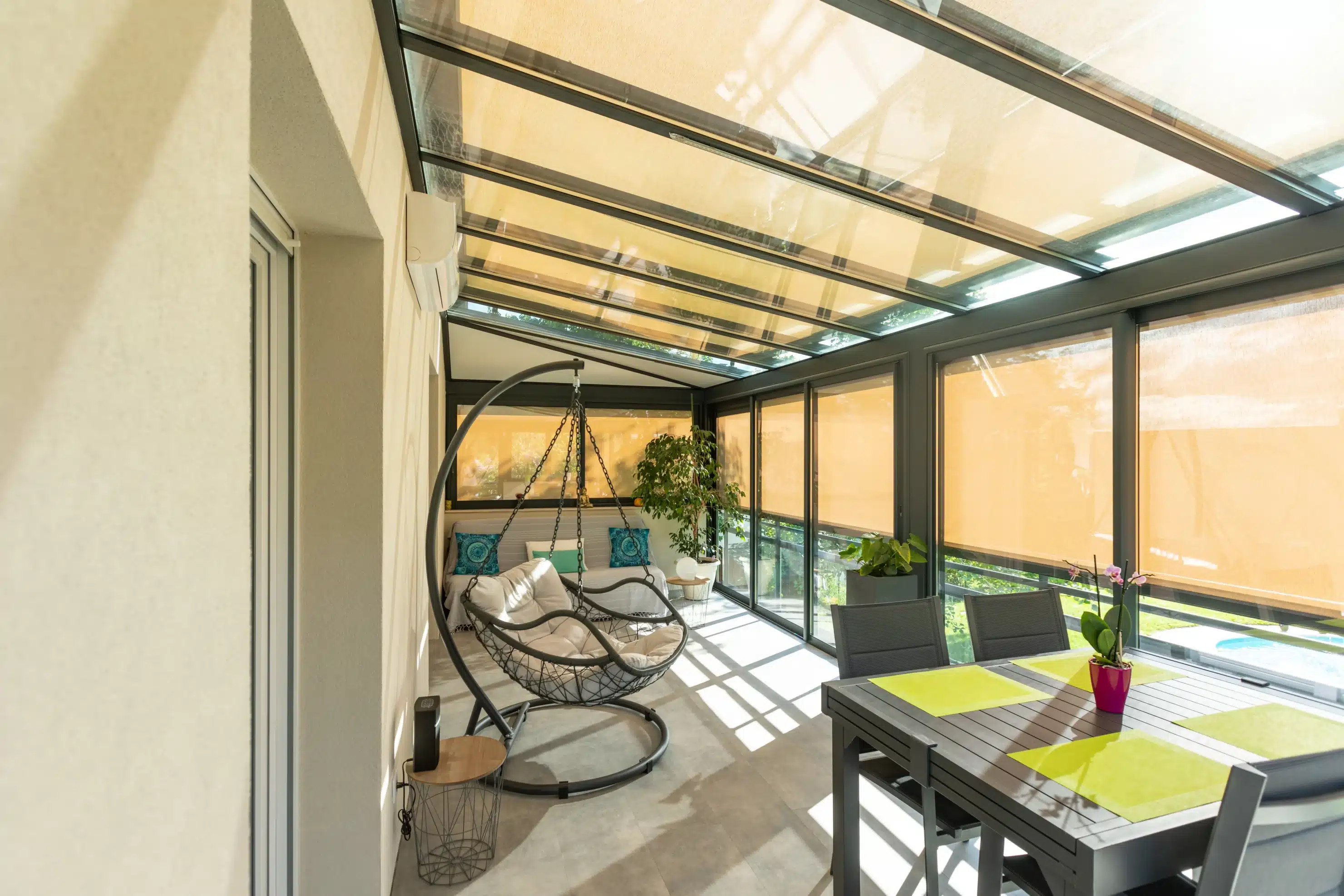 Verral véranda avec store de toiture à Luemschwiller Haut-Rhin